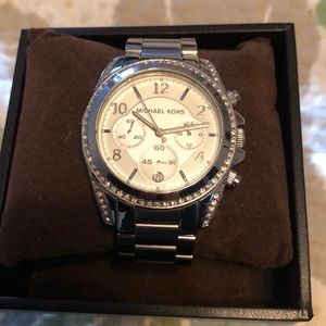 Genuine Michael Kors watch diamond accent.